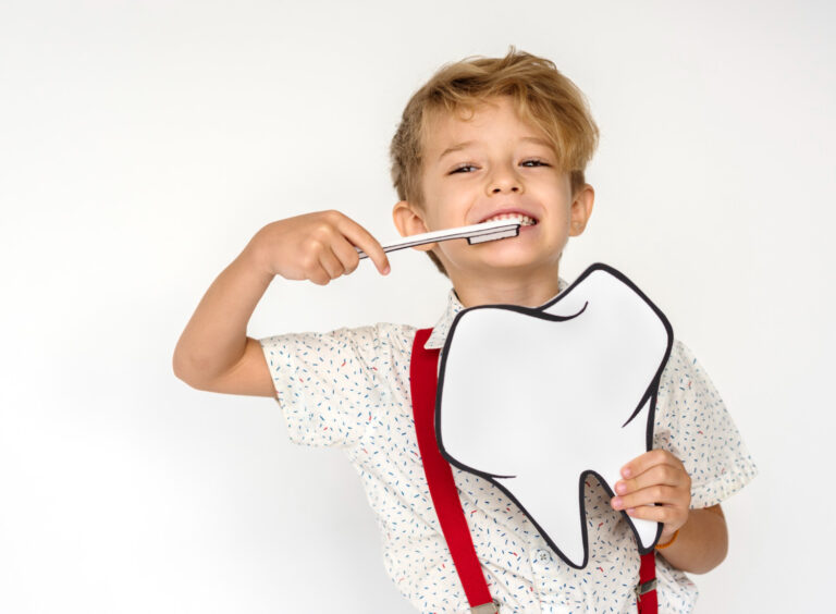 “Child brushing teeth to maintain good oral hygiene for kids”