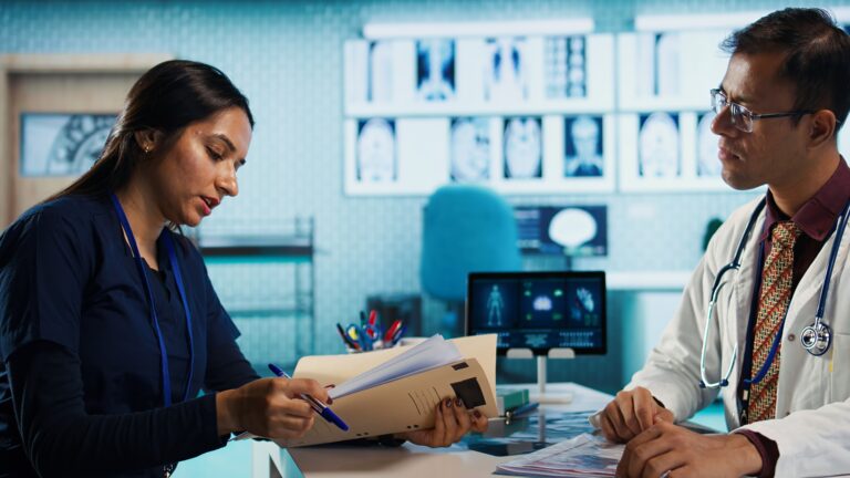 Doctor explaining a personalized treatment plan to a patient during a one-on-one healthcare consultation