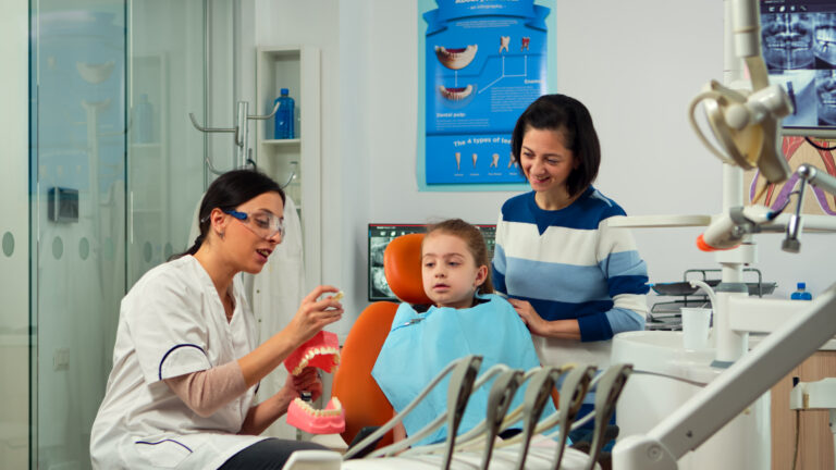 Family dental care showing parents and children visiting a trusted dental clinic